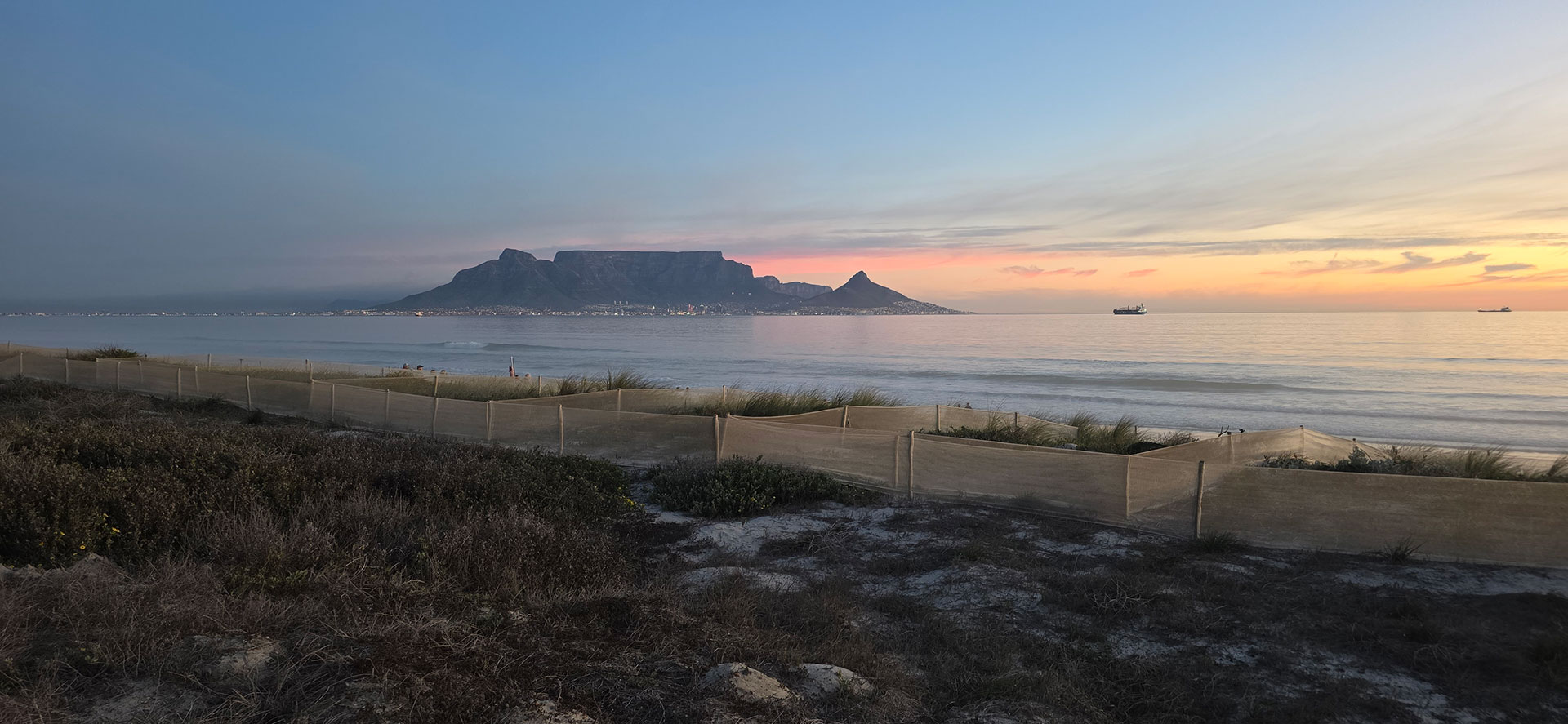 Table Mountain view from Blouberg beach at sunrise